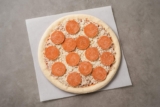 ¿Sabes lo que el papel viene debajo de la pizza congelada?